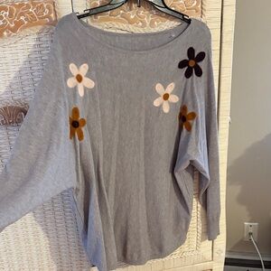 Gray Sweater with Floral Accents